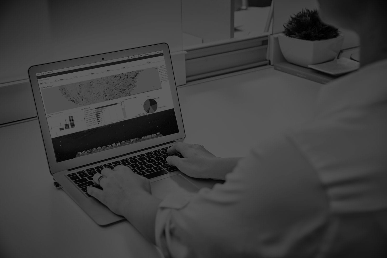 Person viewing ICS Analytics on laptop