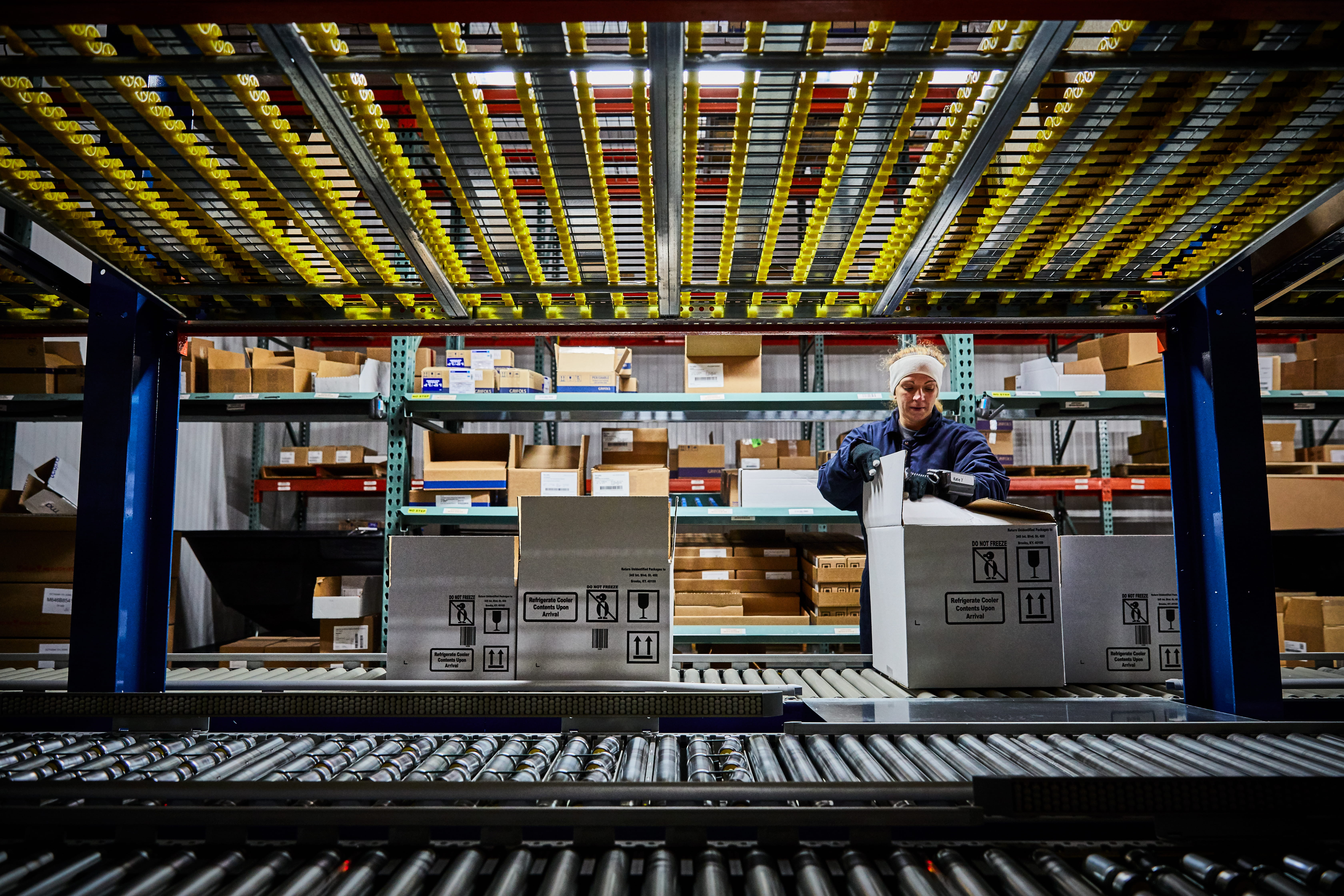 Associate picking in the cooler of our Louisville Speciality Distributions Facility