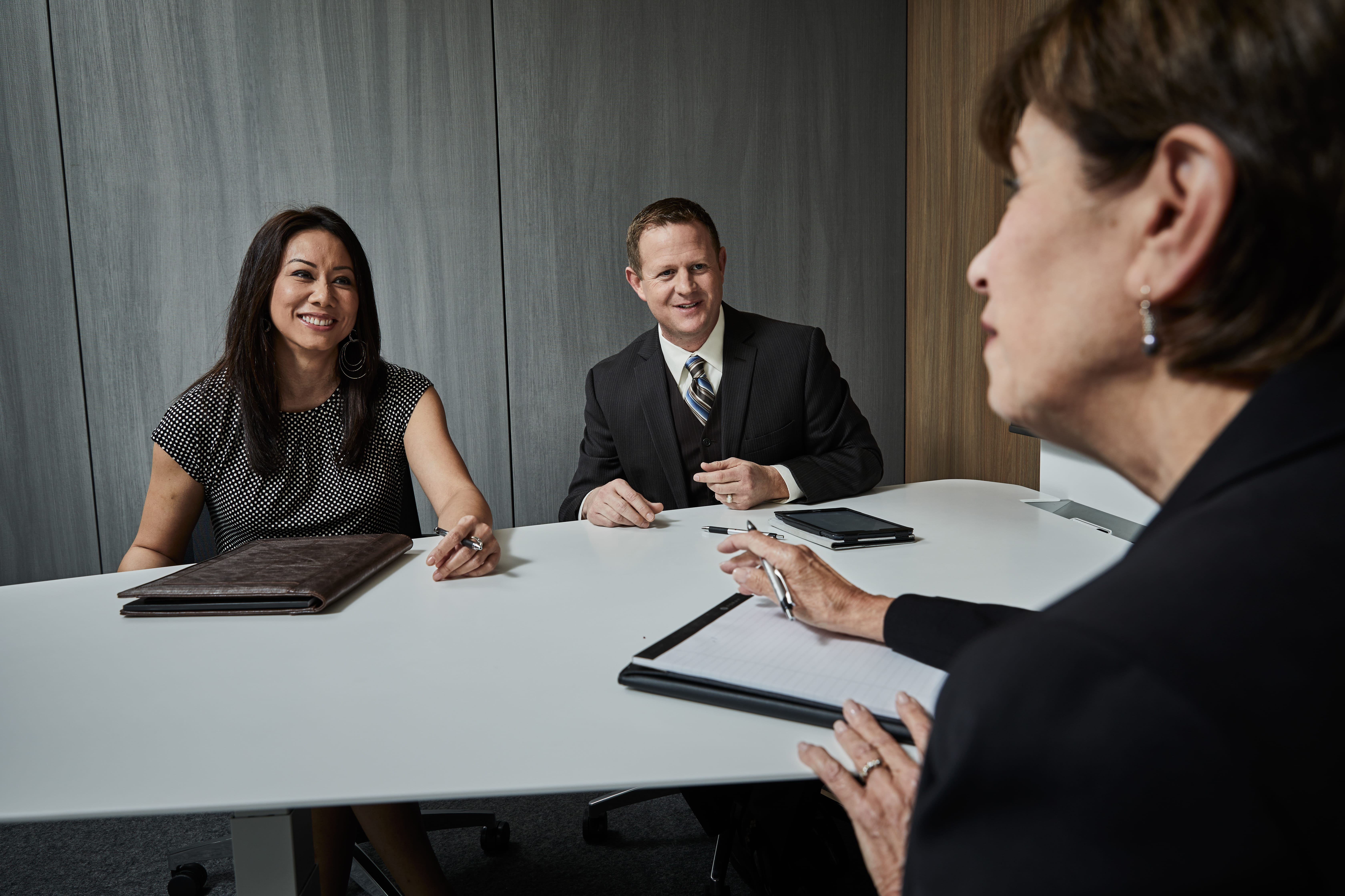 Associates meeting in a conference room