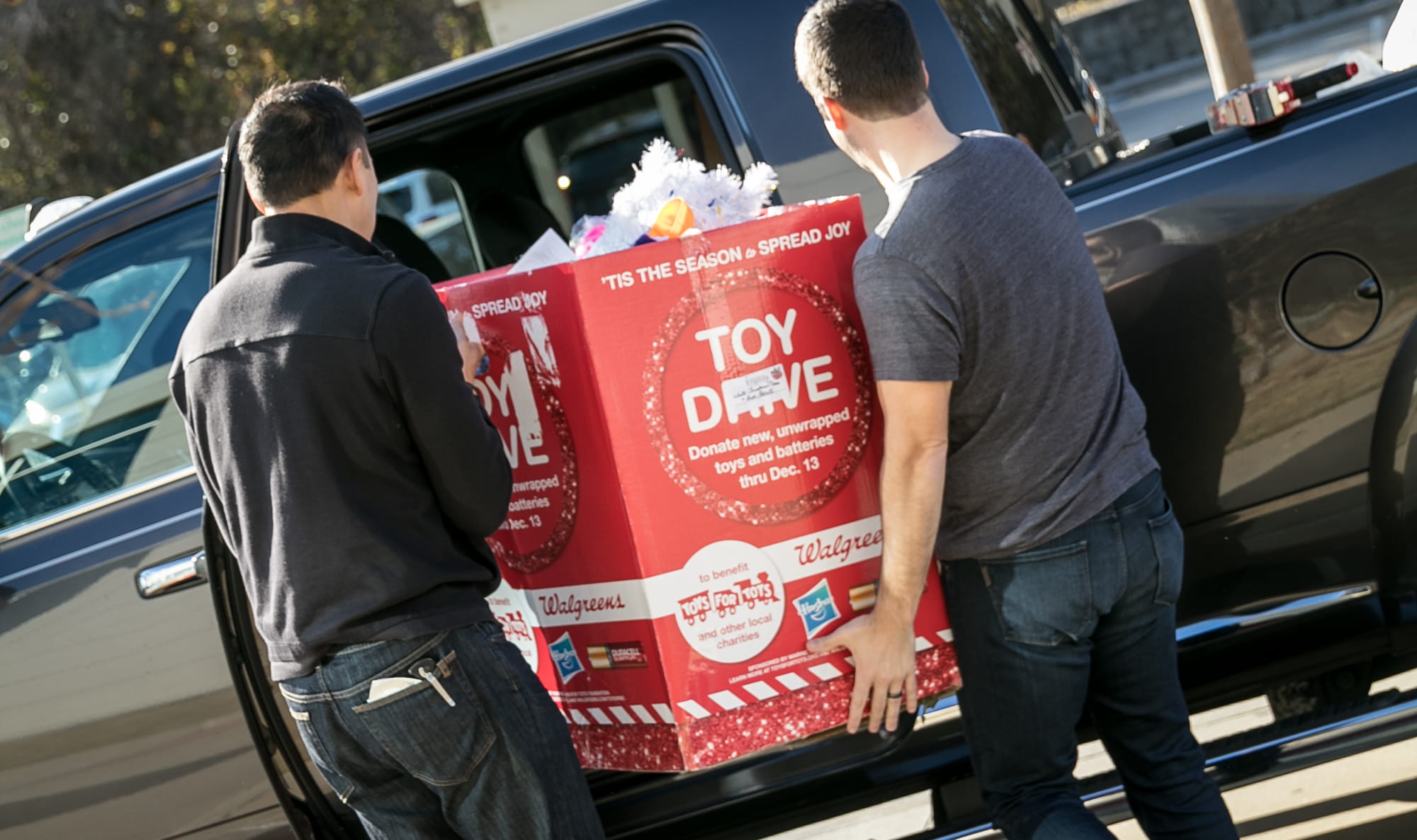 Frisco Associates volunteer at a local toy drive together